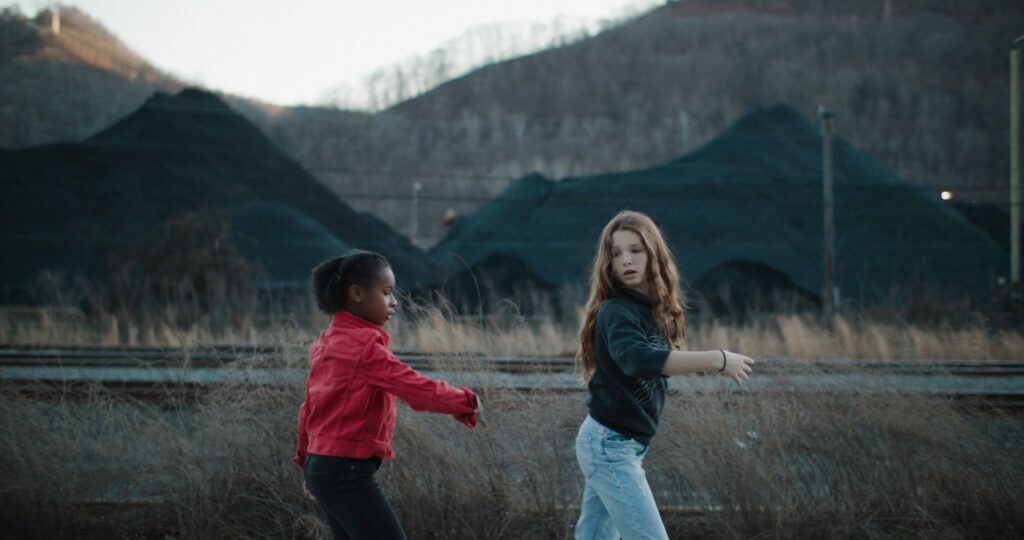 Two girls walking, King Coal