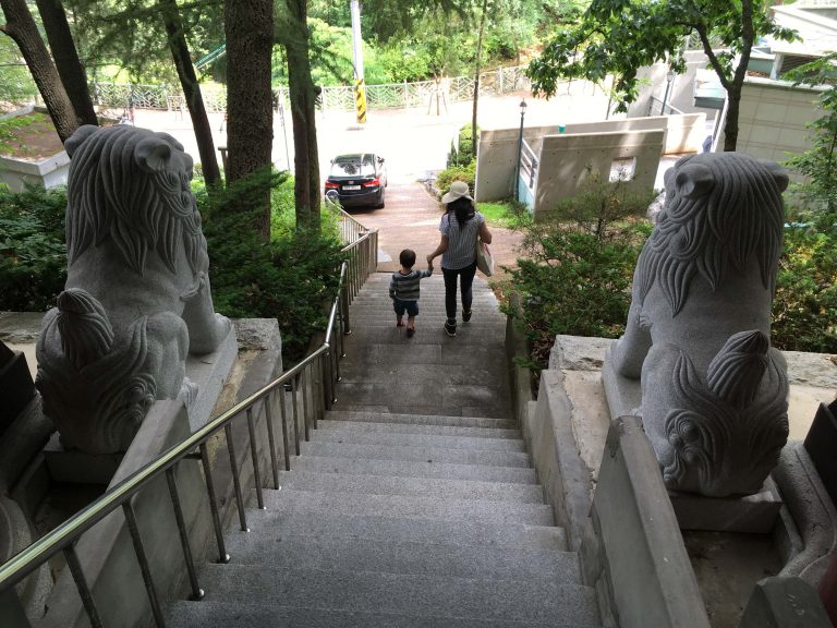 Laube walks with son, Jacob, in Seoul, South Korea in Summer 2019.
