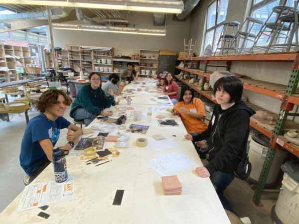 High School Art Academy, a picture of students in the ceramics workshop