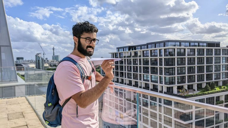 Ali Bhimani with a paper airplane in London. 