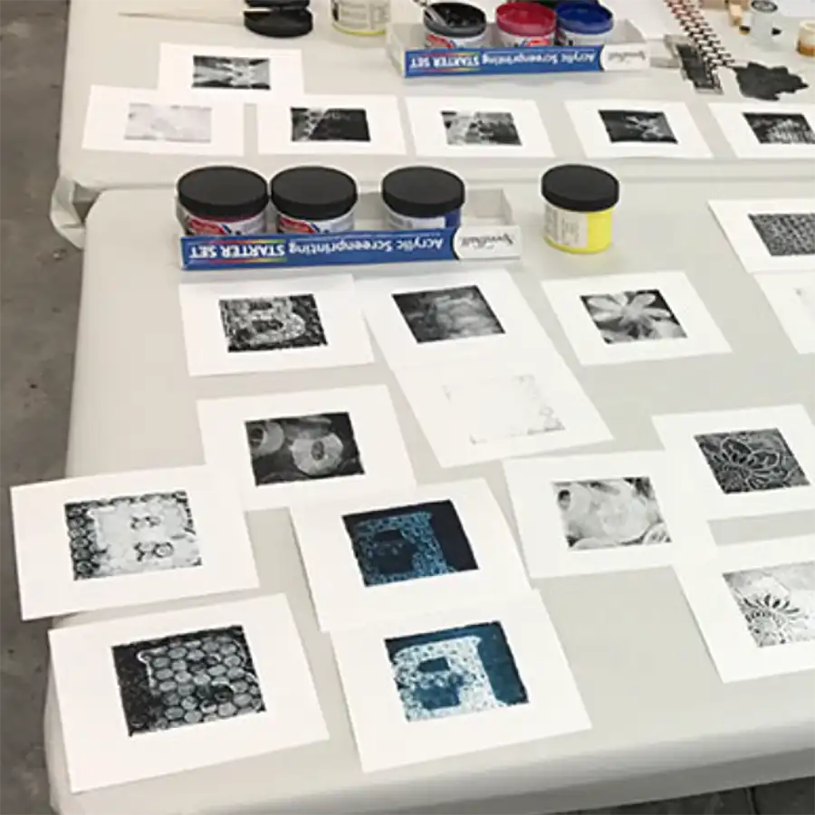 Image of a table full of intaglio prints