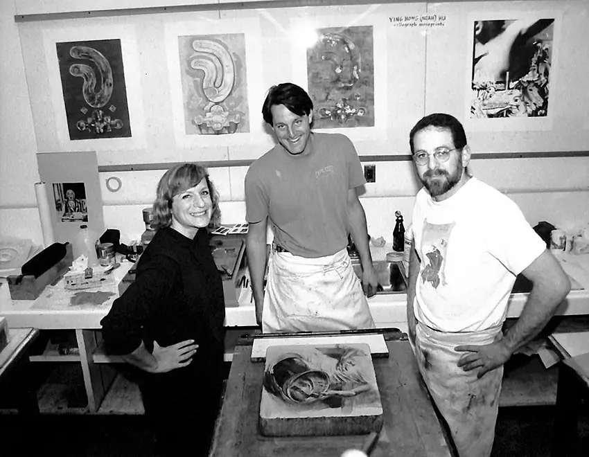Ruth Weisberg with Rich Gere and Andrew Rubin working on one of two stone lithographs Weisberg completed the week before the 1992 SGC Conference. 