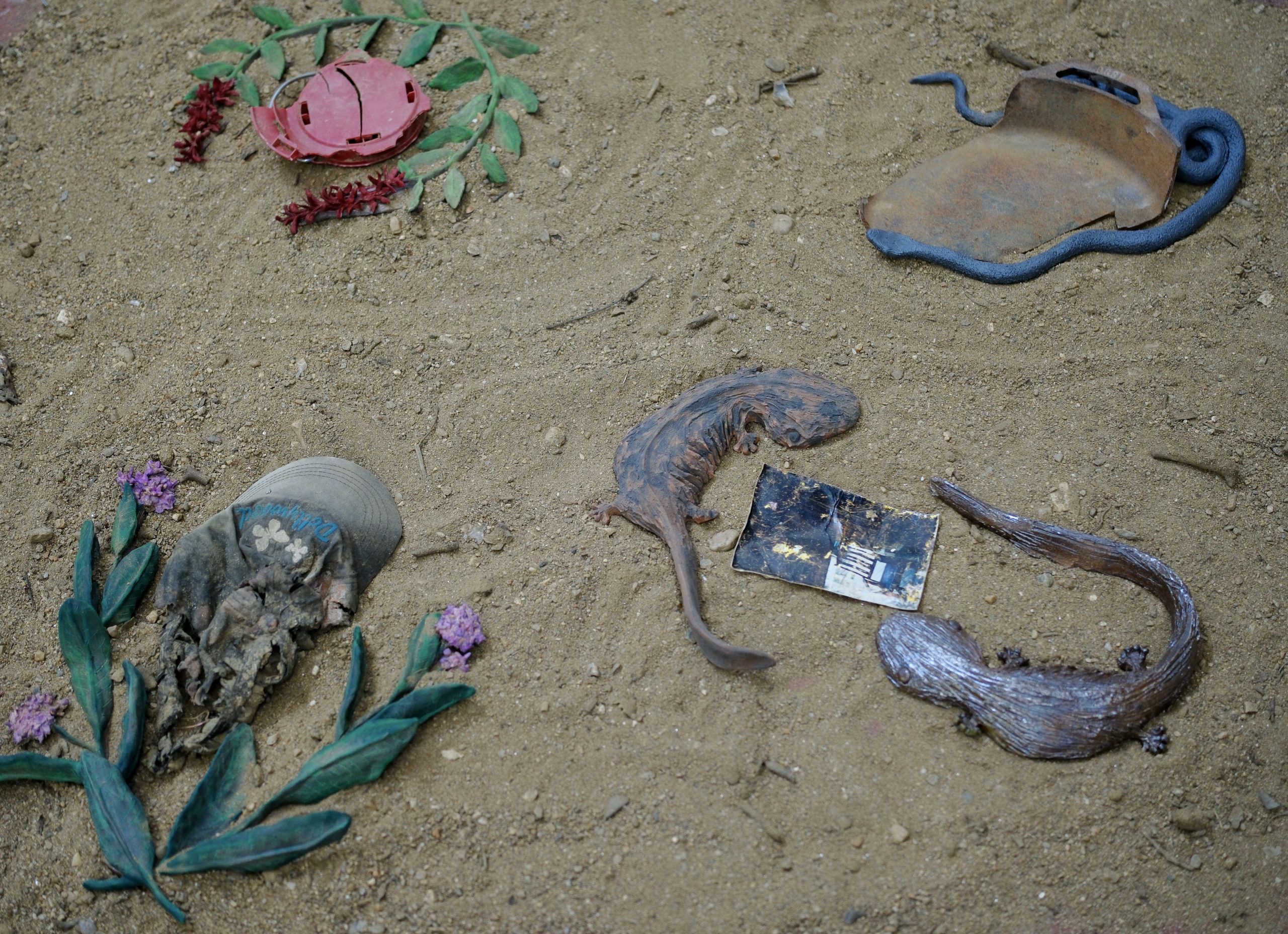After the Flood. Ceramics, found objects from Hurricane Helene, sand from riverbank in Madison county NC, 50" x 48" x 5" 2026.