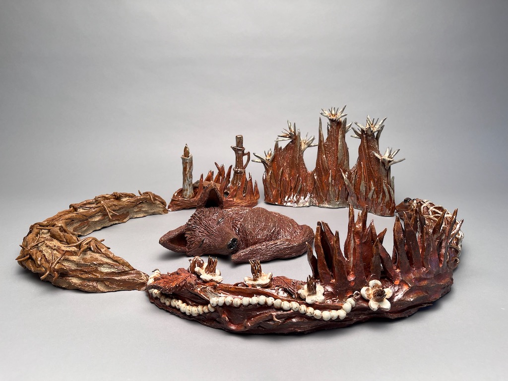 Baby Fox. Soda fired clay, 15" x 36" x 25", 2023