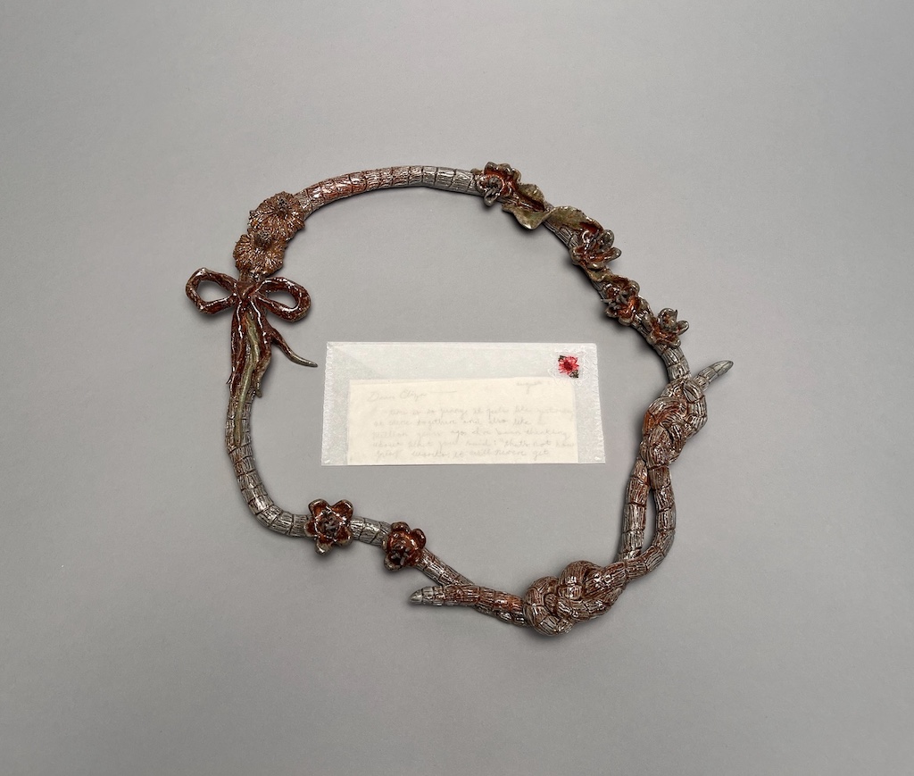 Workings of Grief Letter. Soda fired clay, transparent paper, embroidery thread, handmade paper, ink, 3" x 12" x 15", 2023