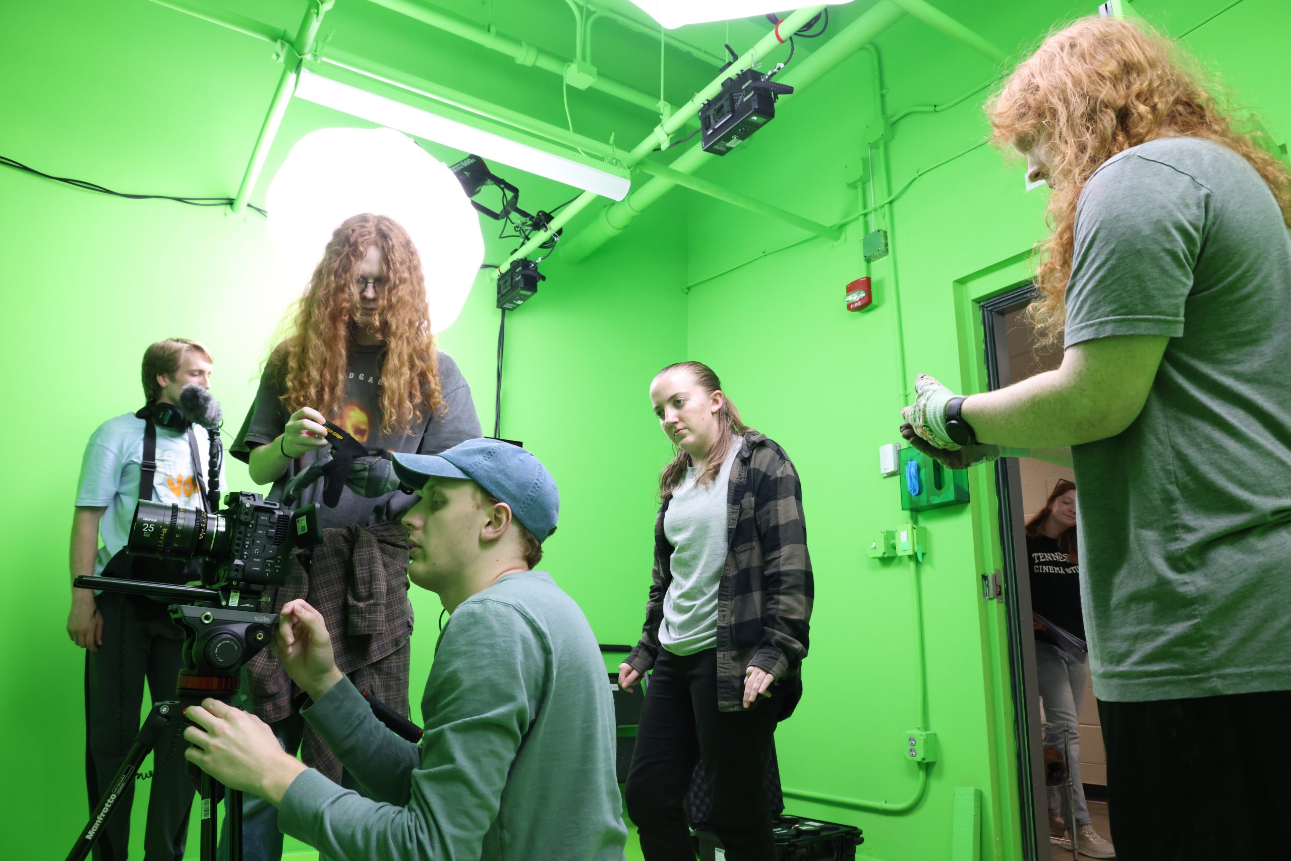 A cinema studies class ina green screen room
