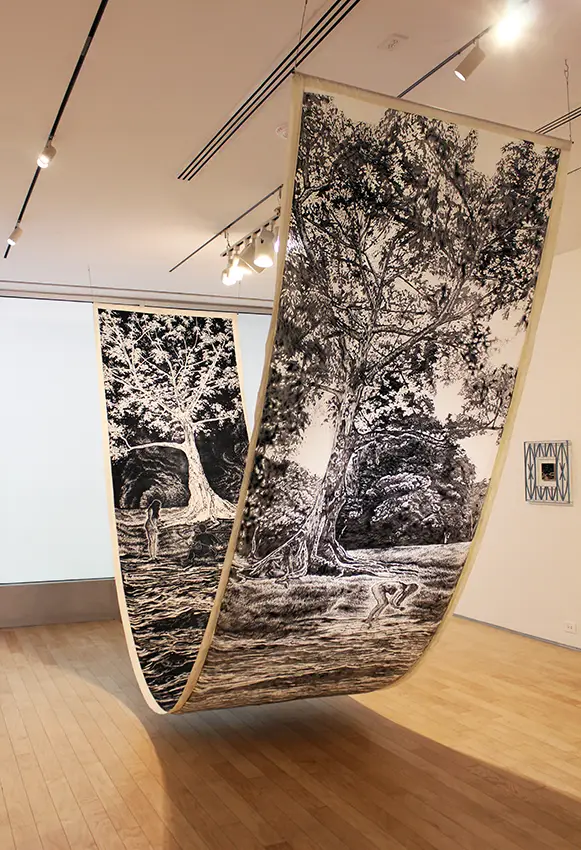 A printed artwork drawing on muslin steel that hangs from two points of a gallery ceiling. 