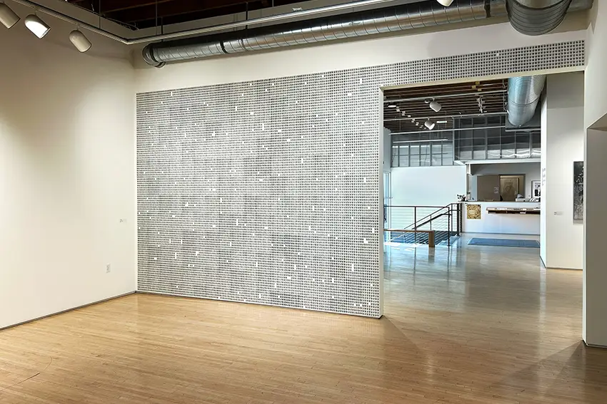 A room where Jade Hoyer's printmaking installation resides. 