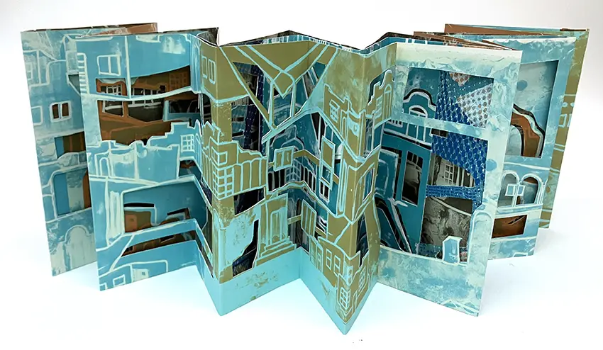 Carousel book displayed which shows various rooms within an intricate house. 